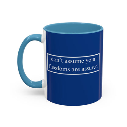 don't assume your freedoms are assured White font Blue Accent Mug by theGreenDragonTavern.shop