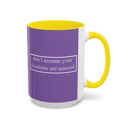 don't assume your freedoms are assured White font Light Purple Accent Mug by theGreenDragonTavern.shop