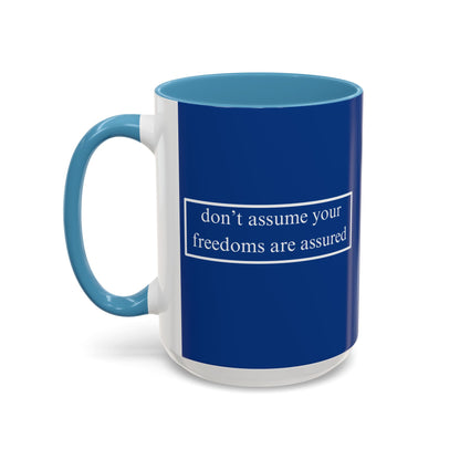 don't assume your freedoms are assured White font Blue Accent Mug by theGreenDragonTavern.shop