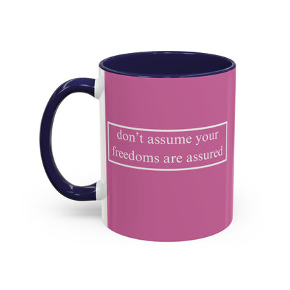 don't assume your freedoms are assured White font Pink Accent Mug by theGreenDragonTavern.shop