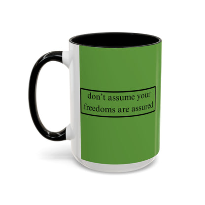 don't assume your freedoms are assured Black font Green Accent Mug by theGreenDragonTavern.shop