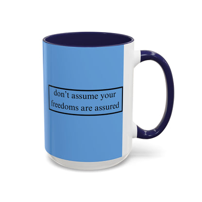 don't assume your freedoms are assured Black font Light Blue Accent Mug by theGreenDragonTavern.shop