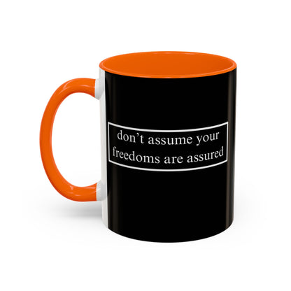 don't assume your freedoms are assured White font Black Accent Mug by theGreenDragonTavern.shop