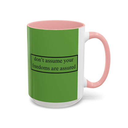 don't assume your freedoms are assured Black font Green Accent Mug by theGreenDragonTavern.shop