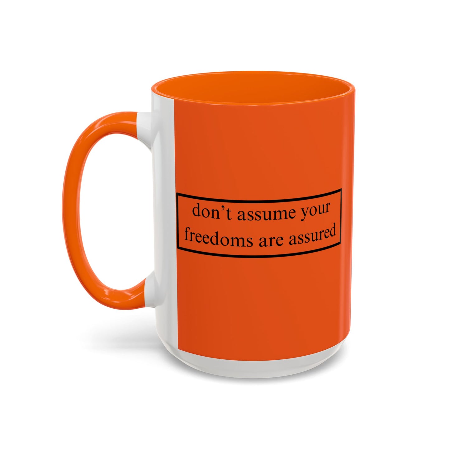 don't assume your freedoms are assured Black font Orange Accent Mug by theGreenDragonTavern.shop