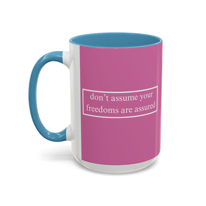 don't assume your freedoms are assured White font Pink Accent Mug by theGreenDragonTavern.shop