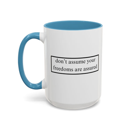 don't assume your freedoms are assured Black font White Accent Mug by theGreenDragonTavern.shop