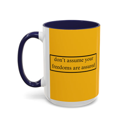 don't assume your freedoms are assured Black font Yellow Accent Mug by theGreenDragonTavern.shop