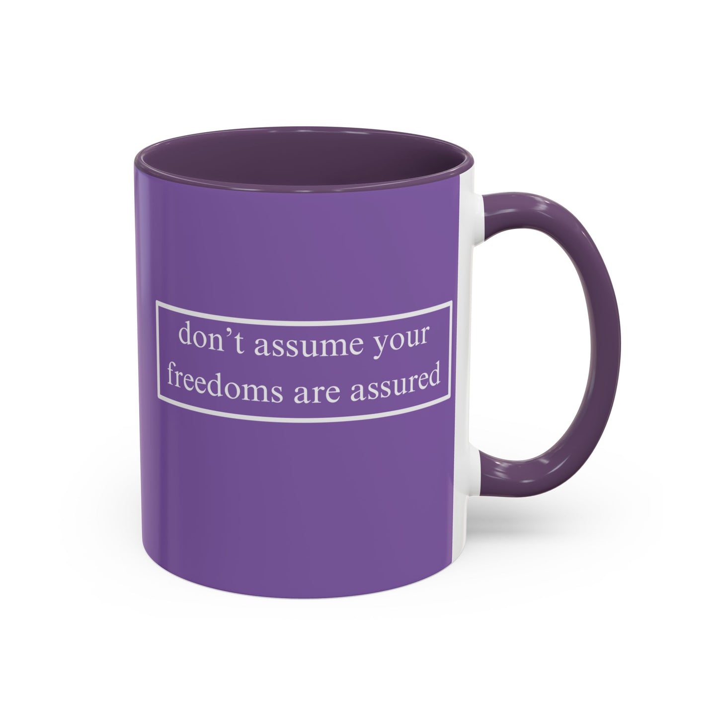 don't assume your freedoms are assured White font Light Purple Accent Mug by theGreenDragonTavern.shop