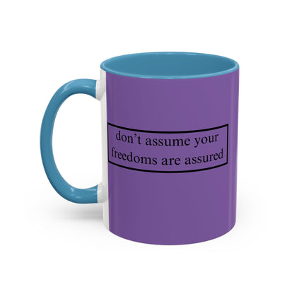don't assume your freedoms are assured Black font Light Purple Accent Mug by theGreenDragonTavern.shop