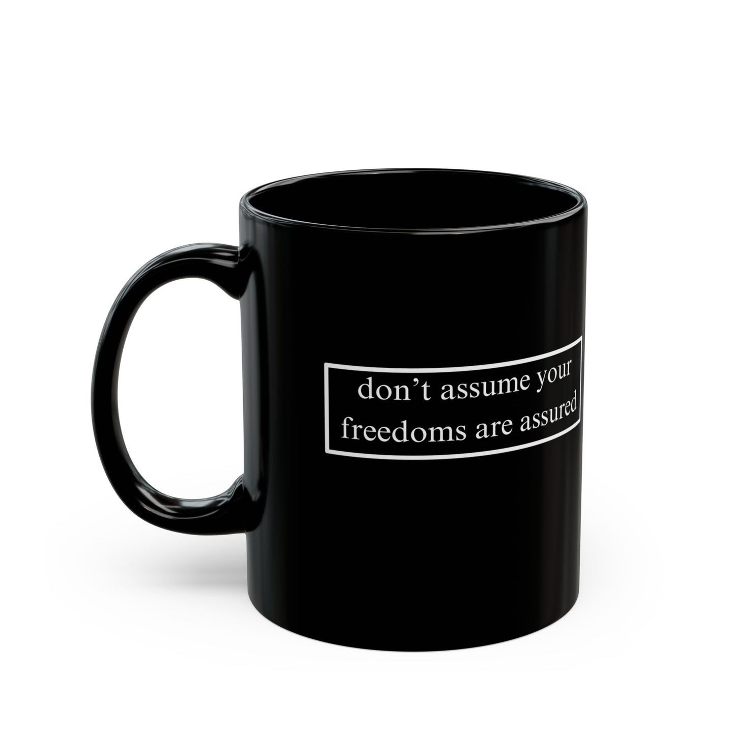 don't assume your freedoms are assured White font Black Mug by theGreenDragonTavern.shop