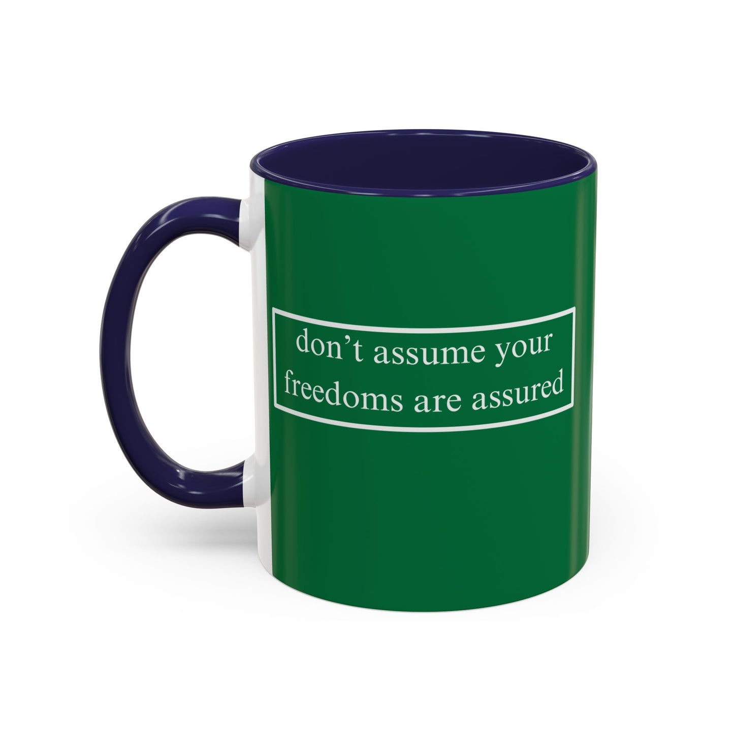 don't assume your freedoms are assured White font Green Accent Mug by theGreenDragonTavern.shop