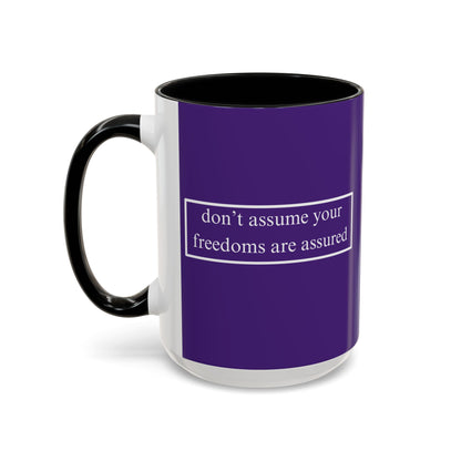 don't assume your freedoms are assured White font Dark Purple Accent Mug by theGreenDragonTavern.shop