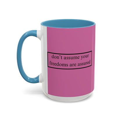 don't assume your freedoms are assured Black font Pink Accent Mug by theGreenDragonTavern.shop