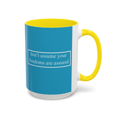 don't assume your freedoms are assured White font Turquoise Accent Mug by theGreenDragonTavern.shop