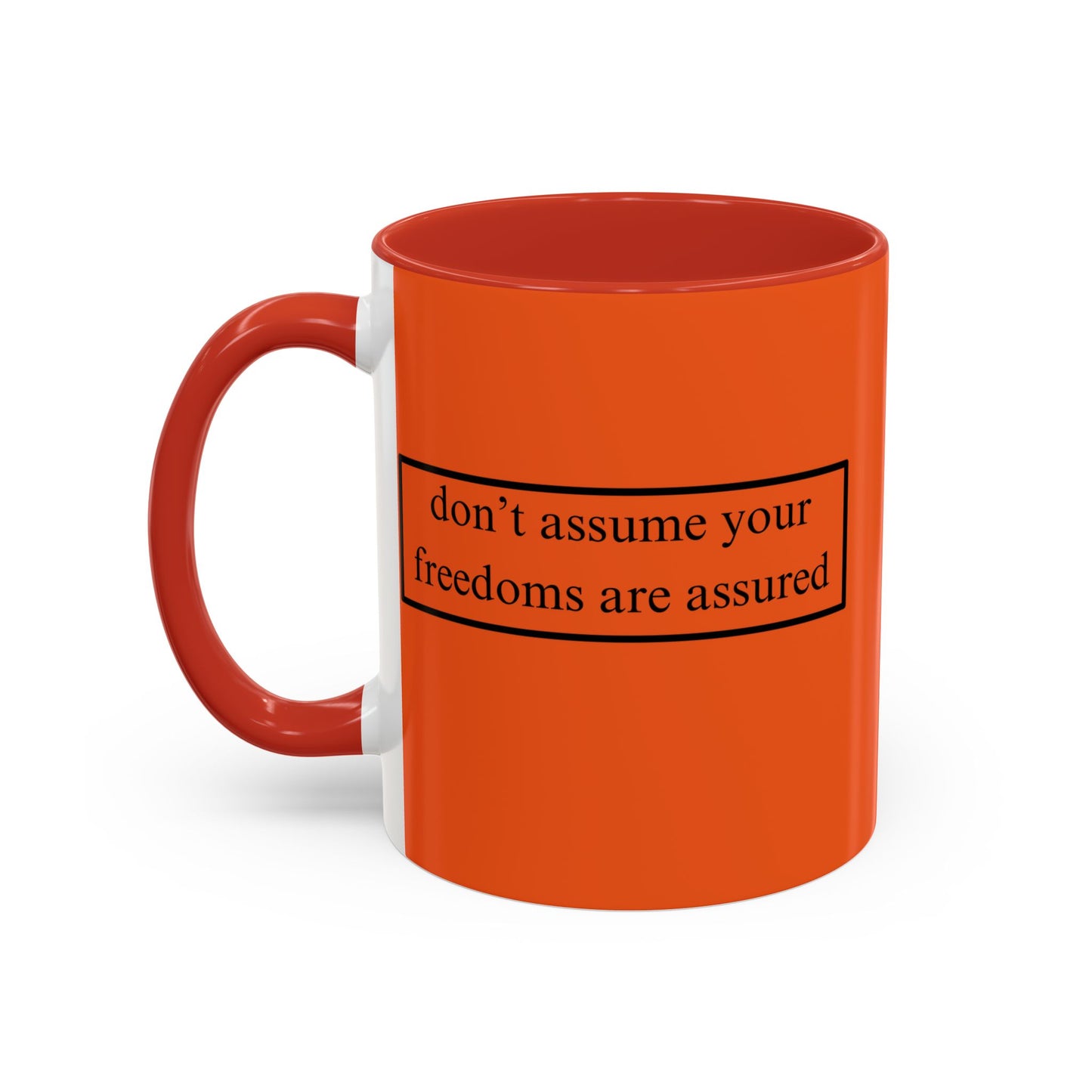 don't assume your freedoms are assured Black font Orange Accent Mug by theGreenDragonTavern.shop