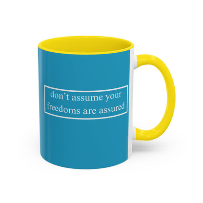 don't assume your freedoms are assured White font Turquoise Accent Mug by theGreenDragonTavern.shop