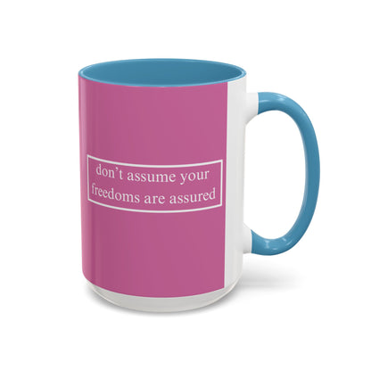 don't assume your freedoms are assured White font Pink Accent Mug by theGreenDragonTavern.shop