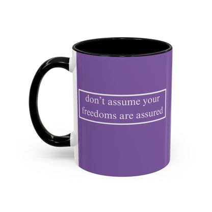 don't assume your freedoms are assured White font Light Purple Accent Mug by theGreenDragonTavern.shop