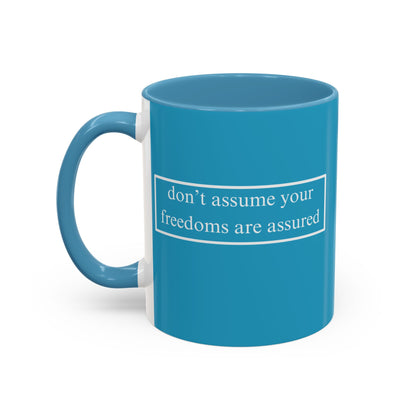 don't assume your freedoms are assured White font Turquoise Accent Mug by theGreenDragonTavern.shop
