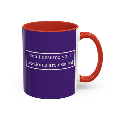 don't assume your freedoms are assured White font Dark Purple Accent Mug by theGreenDragonTavern.shop