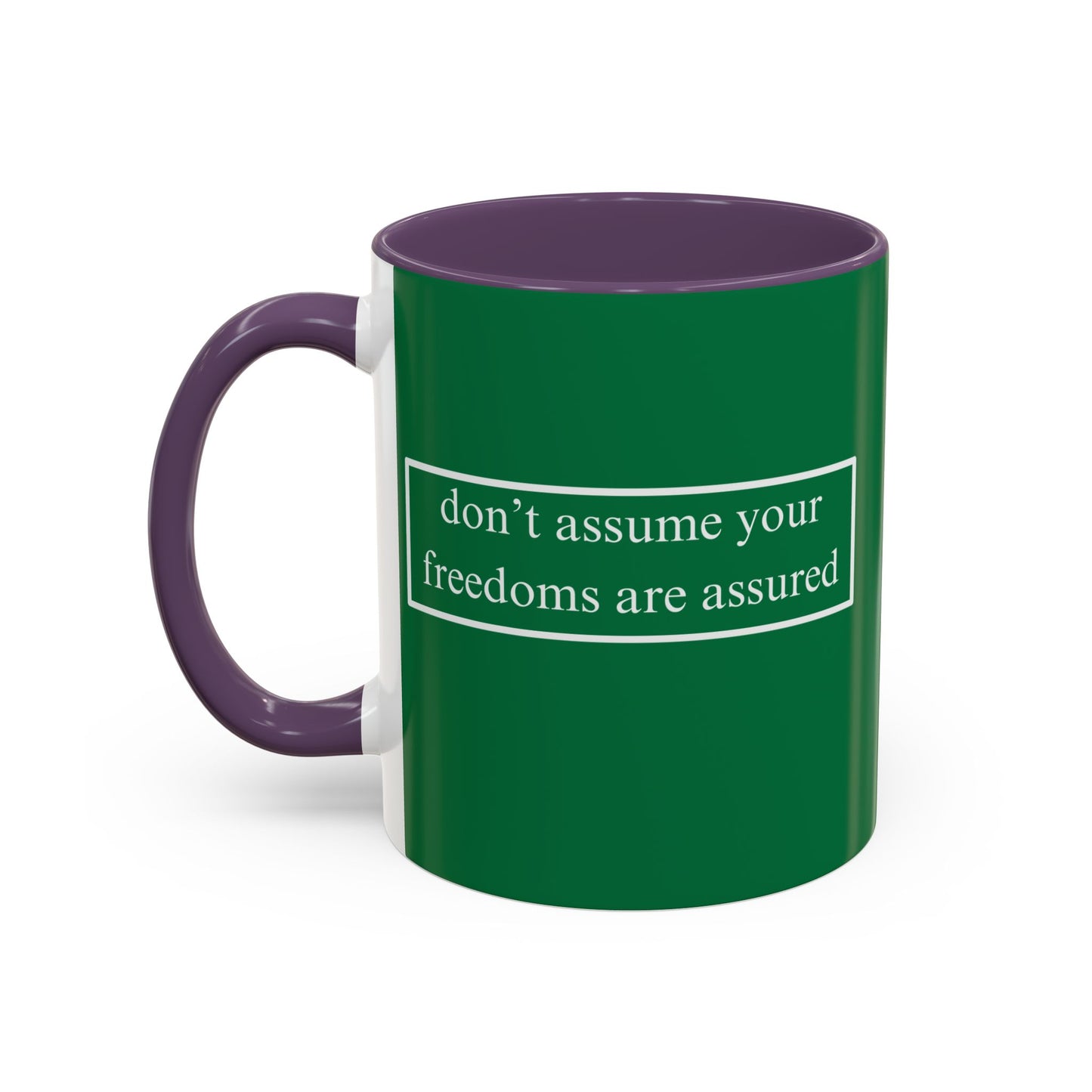 don't assume your freedoms are assured White font Green Accent Mug by theGreenDragonTavern.shop