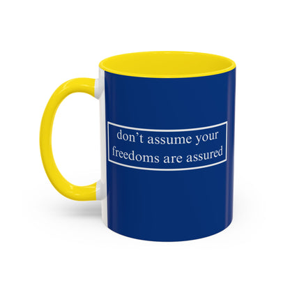 don't assume your freedoms are assured White font Blue Accent Mug by theGreenDragonTavern.shop