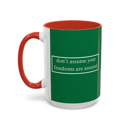 don't assume your freedoms are assured White font Green Accent Mug by theGreenDragonTavern.shop