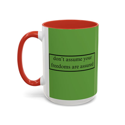 don't assume your freedoms are assured Black font Green Accent Mug by theGreenDragonTavern.shop