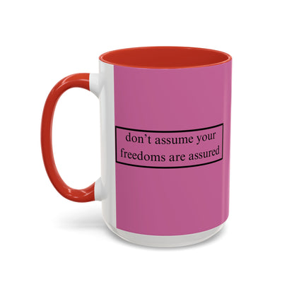 don't assume your freedoms are assured Black font Pink Accent Mug by theGreenDragonTavern.shop