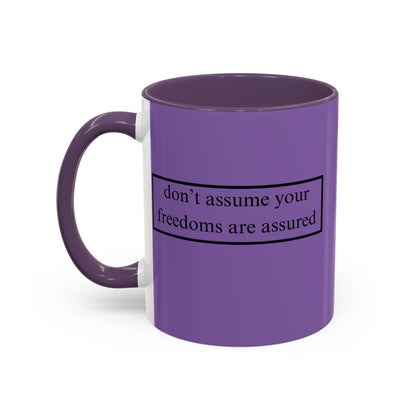 don't assume your freedoms are assured Black font Light Purple Accent Mug by theGreenDragonTavern.shop