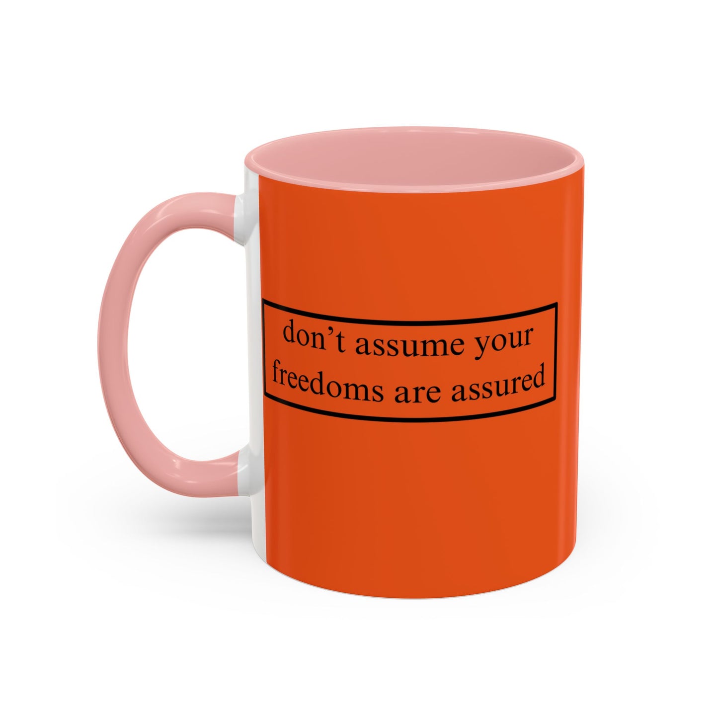 don't assume your freedoms are assured Black font Orange Accent Mug by theGreenDragonTavern.shop