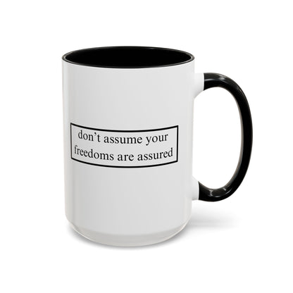 don't assume your freedoms are assured Black font White Accent Mug by theGreenDragonTavern.shop