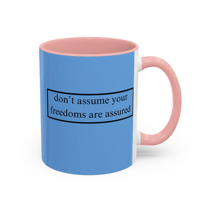 don't assume your freedoms are assured Black font Light Blue Accent Mug by theGreenDragonTavern.shop