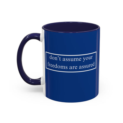 don't assume your freedoms are assured White font Blue Accent Mug by theGreenDragonTavern.shop