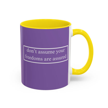 don't assume your freedoms are assured White font Light Purple Accent Mug by theGreenDragonTavern.shop