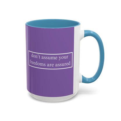 don't assume your freedoms are assured White font Light Purple Accent Mug by theGreenDragonTavern.shop
