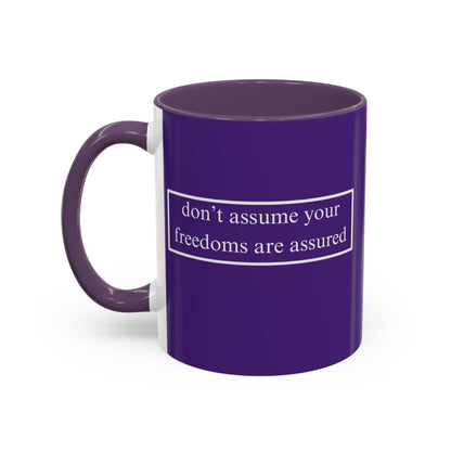 don't assume your freedoms are assured White font Dark Purple Accent Mug by theGreenDragonTavern.shop