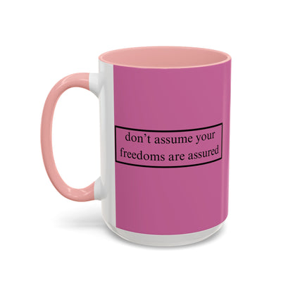 don't assume your freedoms are assured Black font Pink Accent Mug by theGreenDragonTavern.shop