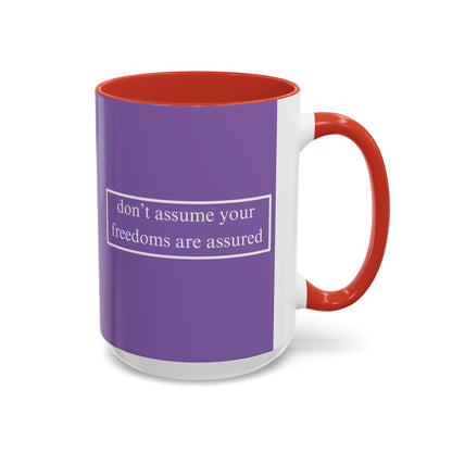 don't assume your freedoms are assured White font Light Purple Accent Mug by theGreenDragonTavern.shop