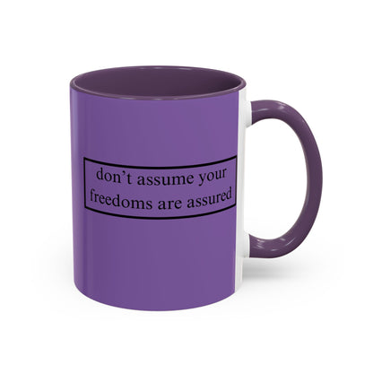 don't assume your freedoms are assured Black font Light Purple Accent Mug by theGreenDragonTavern.shop