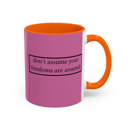 don't assume your freedoms are assured Black font Pink Accent Mug by theGreenDragonTavern.shop