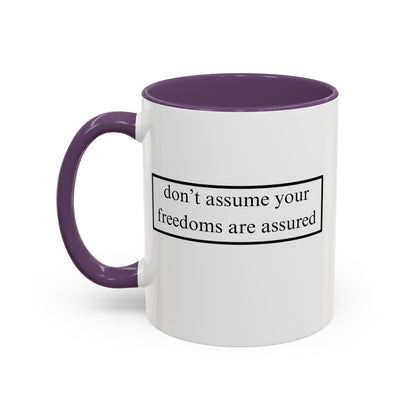don't assume your freedoms are assured Black font White Accent Mug by theGreenDragonTavern.shop