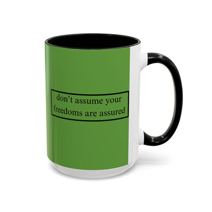 don't assume your freedoms are assured Black font Green Accent Mug by theGreenDragonTavern.shop