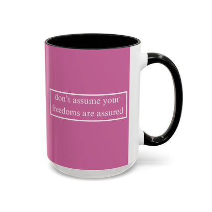 don't assume your freedoms are assured White font Pink Accent Mug by theGreenDragonTavern.shop