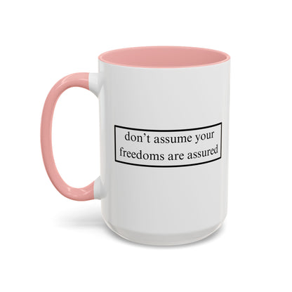 don't assume your freedoms are assured Black font White Accent Mug by theGreenDragonTavern.shop