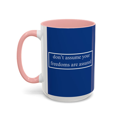 don't assume your freedoms are assured White font Blue Accent Mug by theGreenDragonTavern.shop