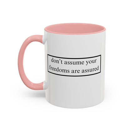 don't assume your freedoms are assured Black font White Accent Mug by theGreenDragonTavern.shop