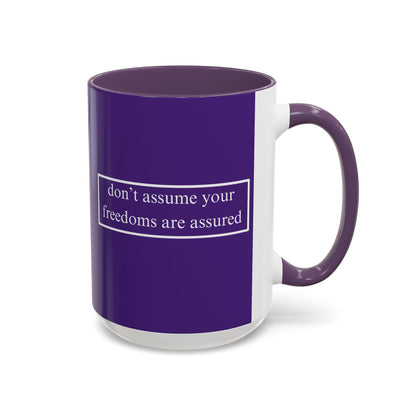 don't assume your freedoms are assured White font Dark Purple Accent Mug by theGreenDragonTavern.shop