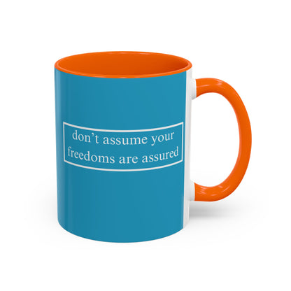 don't assume your freedoms are assured White font Turquoise Accent Mug by theGreenDragonTavern.shop